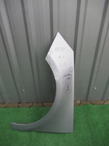 AUDI A1 8X0 8XA BŁOTNIK LEWY SREBRNY 8X0821105A