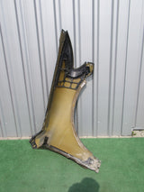 VW TOUAREG I 1 07- 7L LIFT BŁOTNIK LEWY 7L6821105G