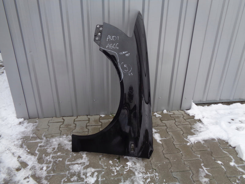 AUDI A6 C6 4F 04-09 BŁOTNIK LEWY 4F0821103A