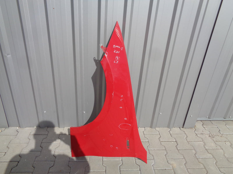 BMW 1 E81 E87 E88 E81 E82 BŁOTNIK LEWY ORYGINAŁ