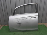 OPEL CORSA E X15 14-19 DRZWI LEWE PRZÓD SREBRNY MET. Z176 13433938