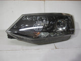 SKODA FABIA III 3 6V 14- LAMPA LEWA SOCZEWKA CZARNA 6V1941015B